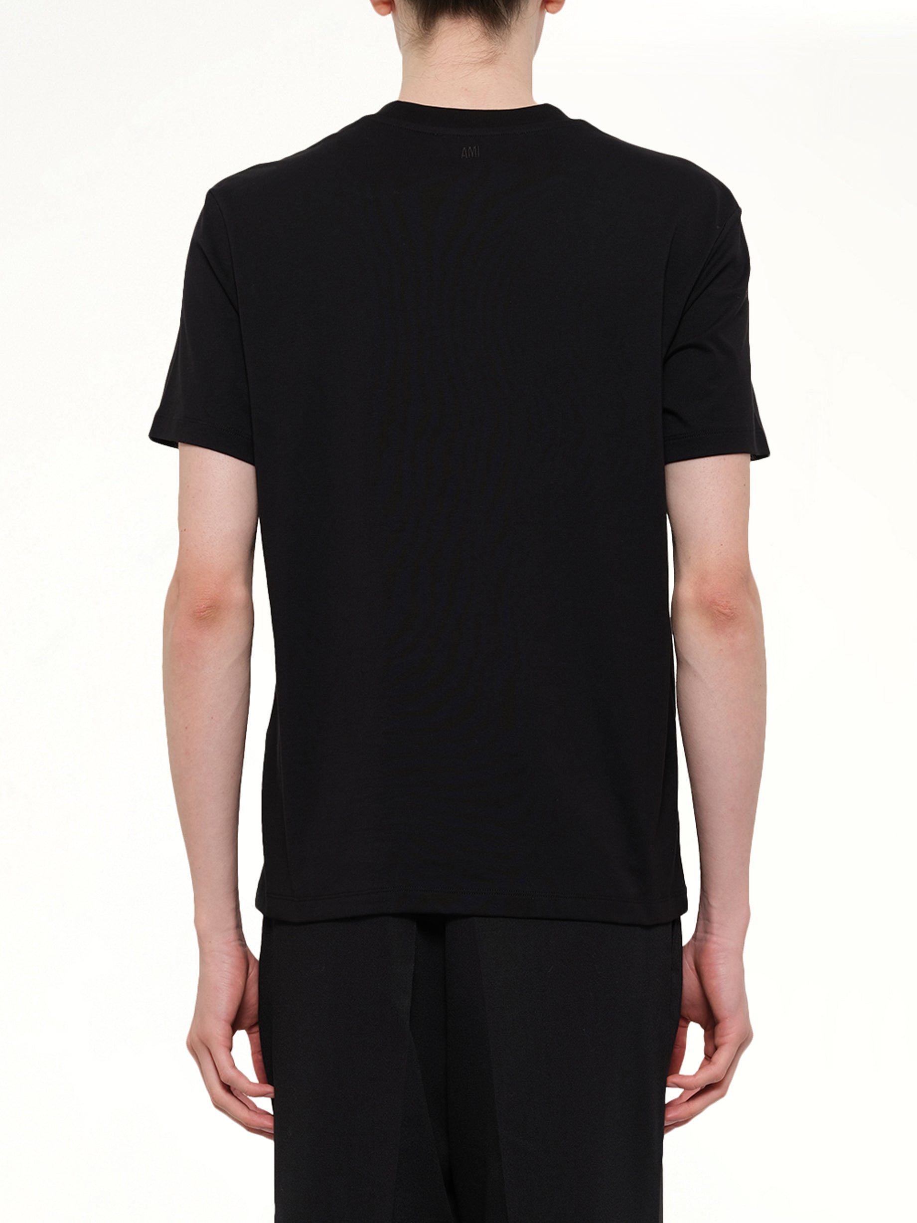 AMI PARIS Contrasted Ami De Coeur T-Shirt in Black Back View from MARAIS