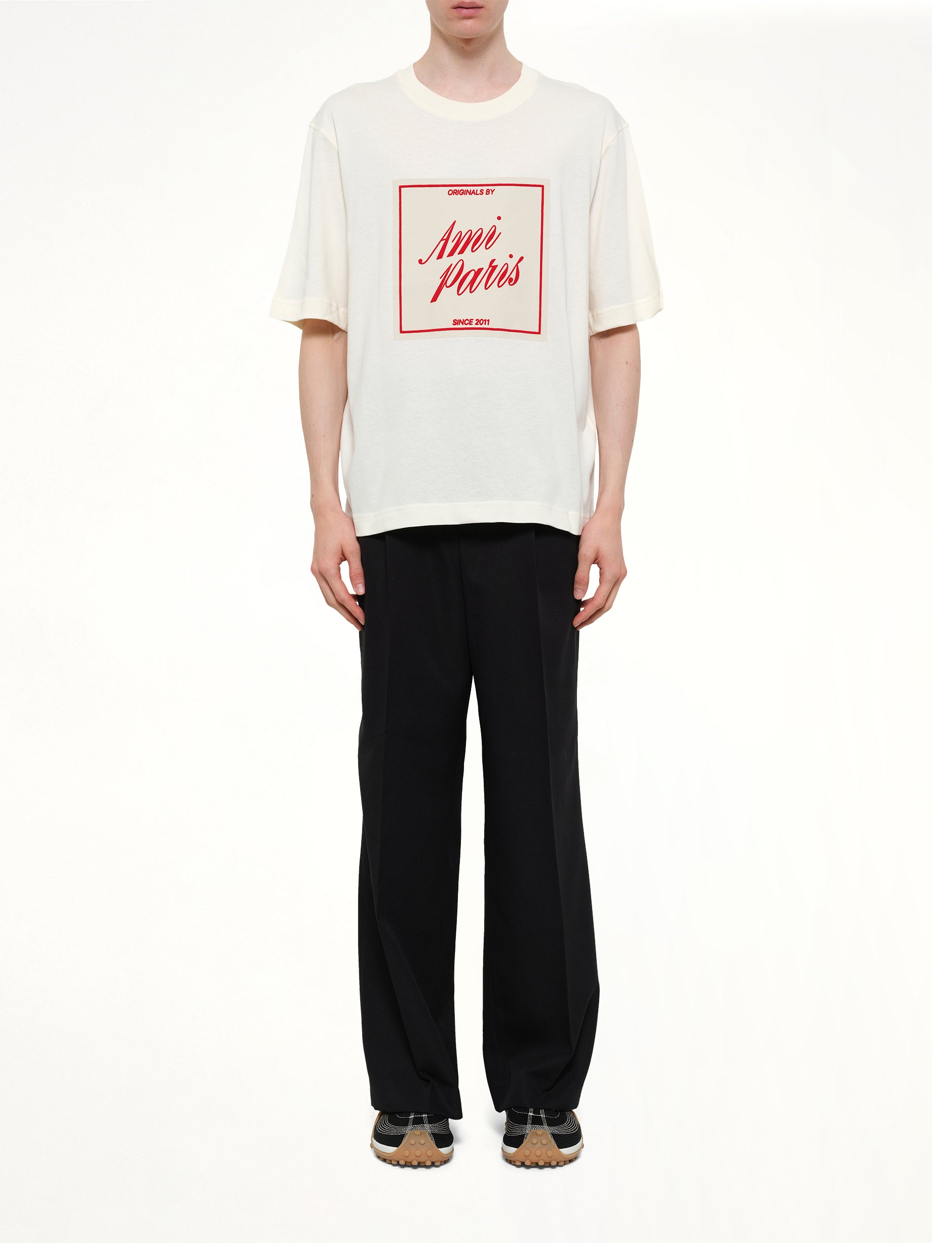 AMI PARIS Signature Print Boxy Fit T-Shirt in White Model View from MARAIS