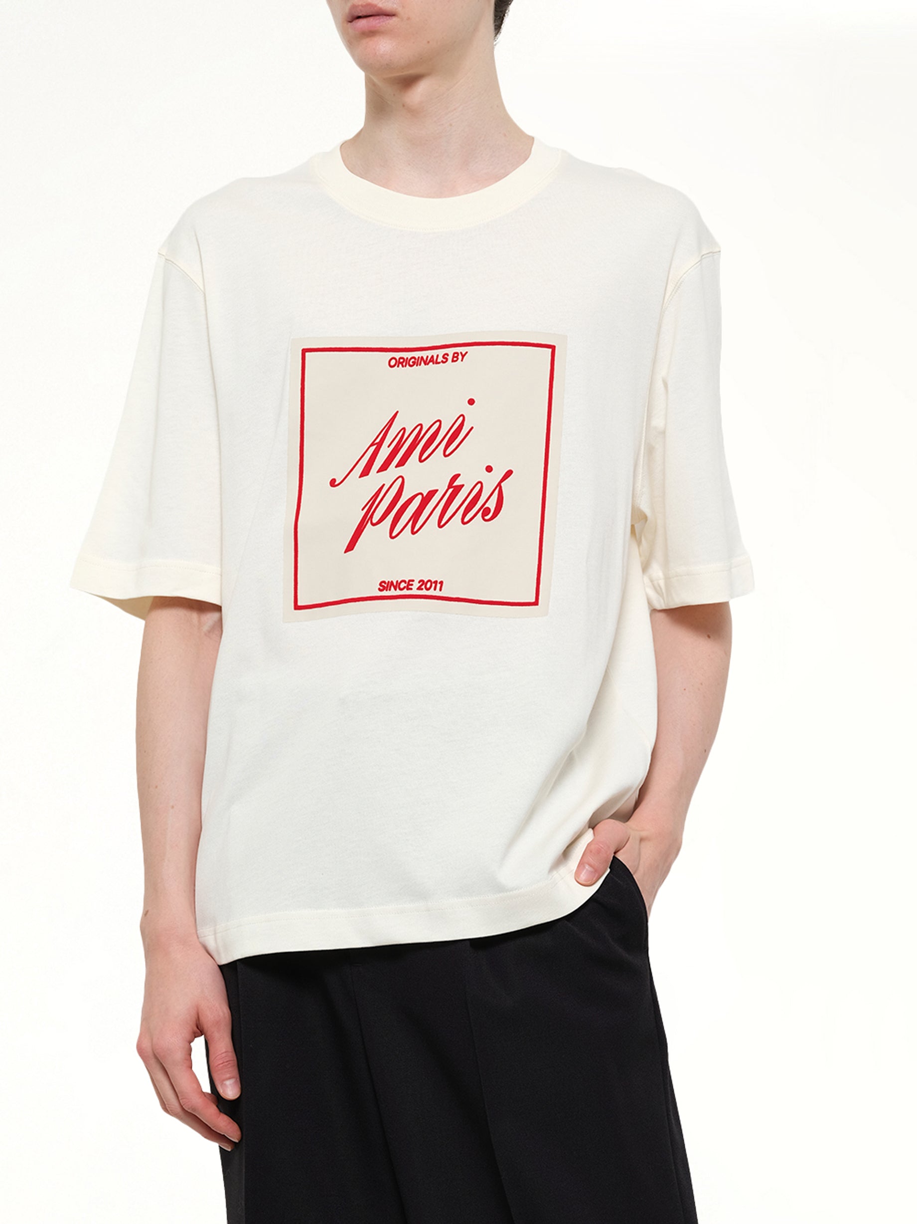 AMI PARIS Signature Print Boxy Fit T-Shirt in White Detail Shot from MARAIS