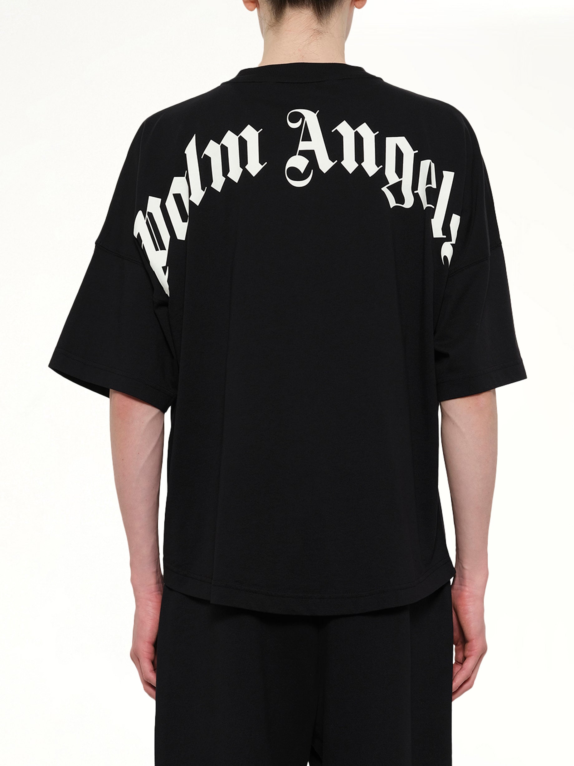 PALM ANGELS Classic Logo Over T-Shirt in Black/Off White Back View from MARAIS