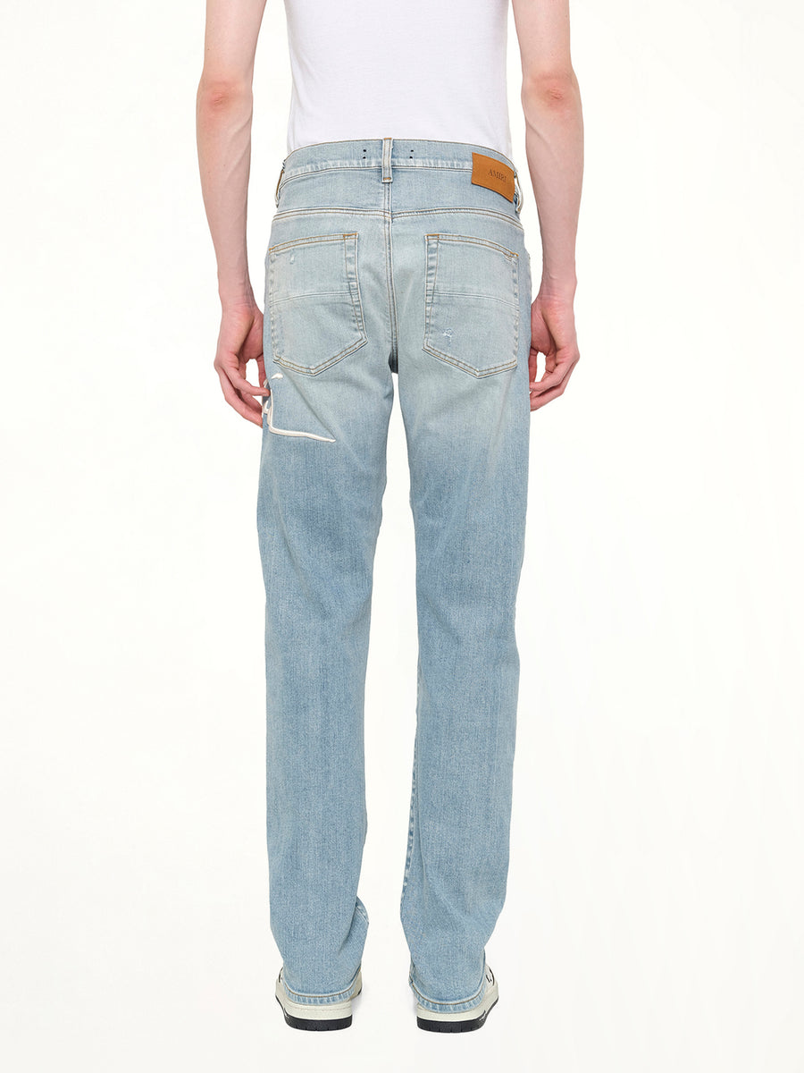 Amiri Repaired Slim Jean in Worn Slate