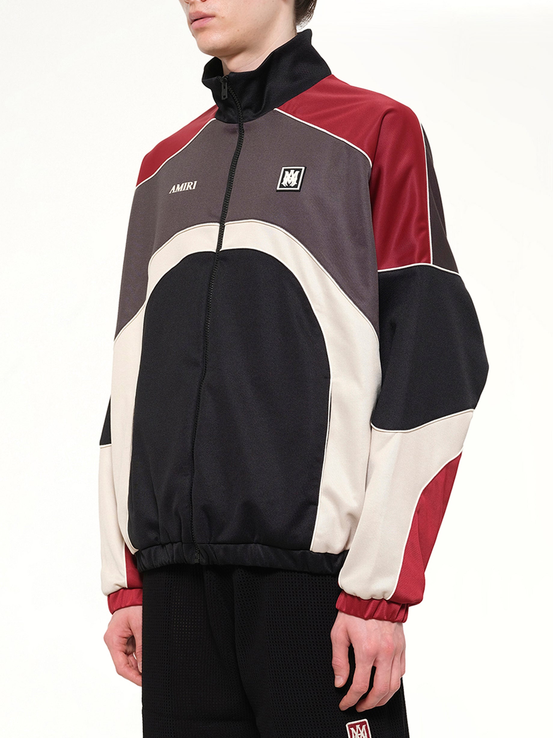 AMIRI Panel Track Jacket in Black Side View from MARAIS