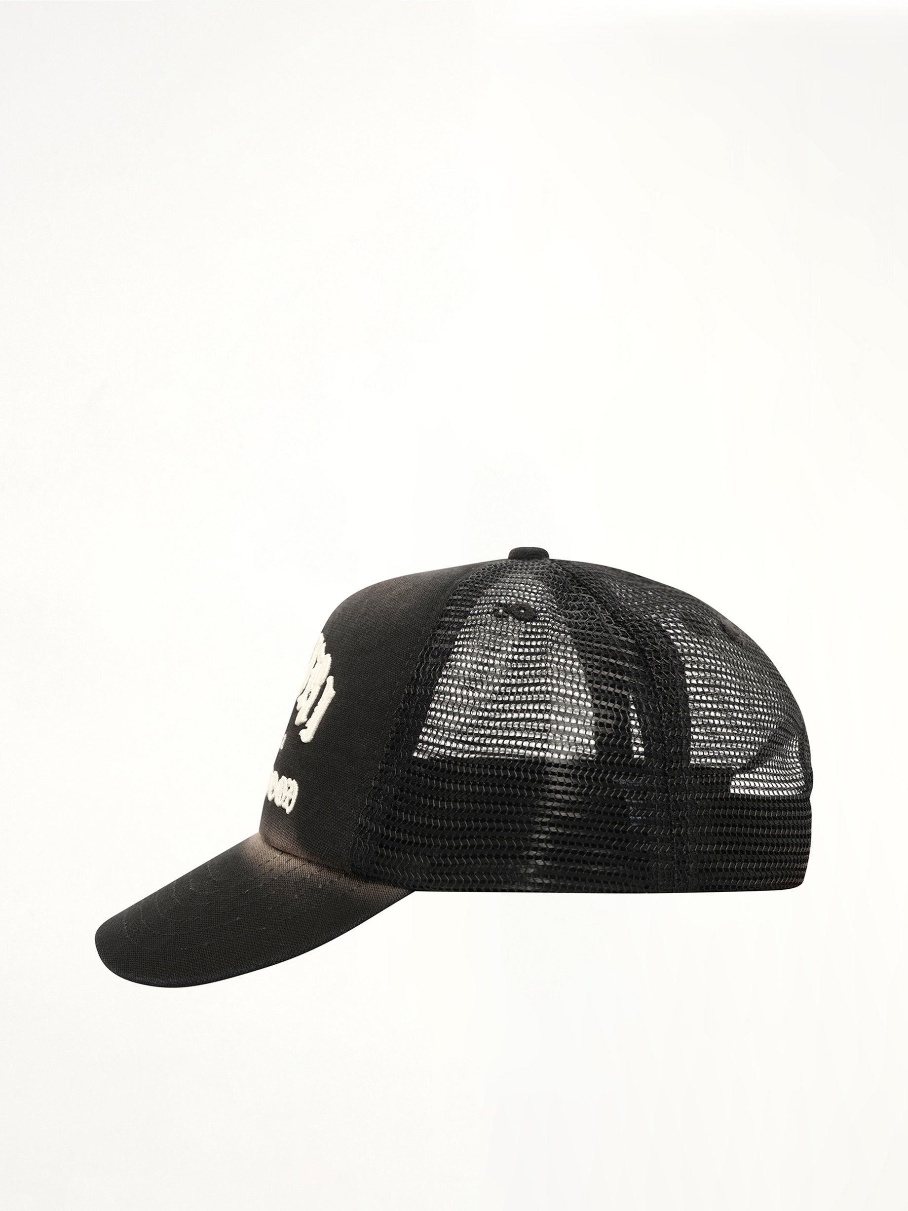 AMIRI Faded Amiri Hollywood Trucker Hat in Black Side View from MARAIS