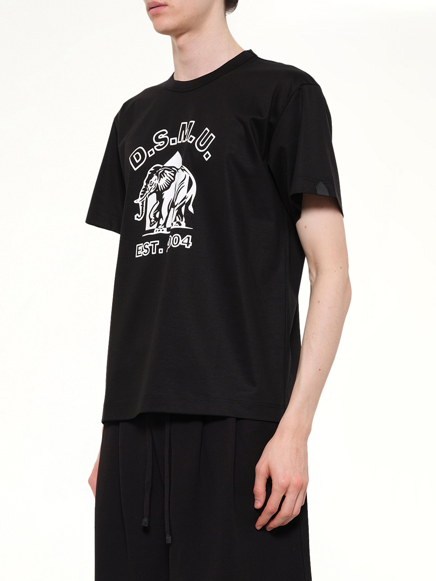 DOVER STREET MARKET D.S.M.U' T-Shirt in Black Side View from MARAIS