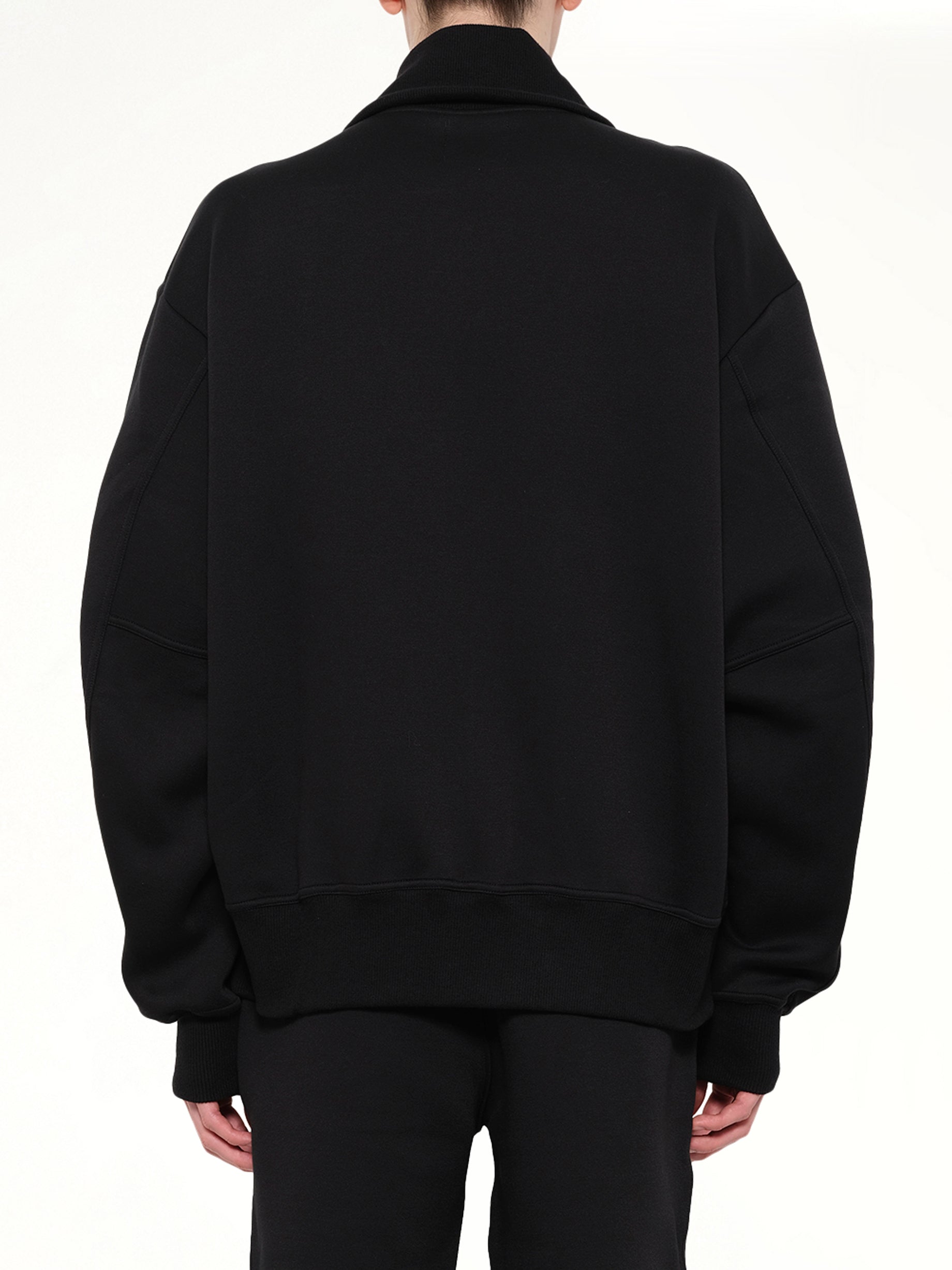 DOVER STREET MARKET Doublet Knit Varsity Jacket in Black Back View from MARAIS