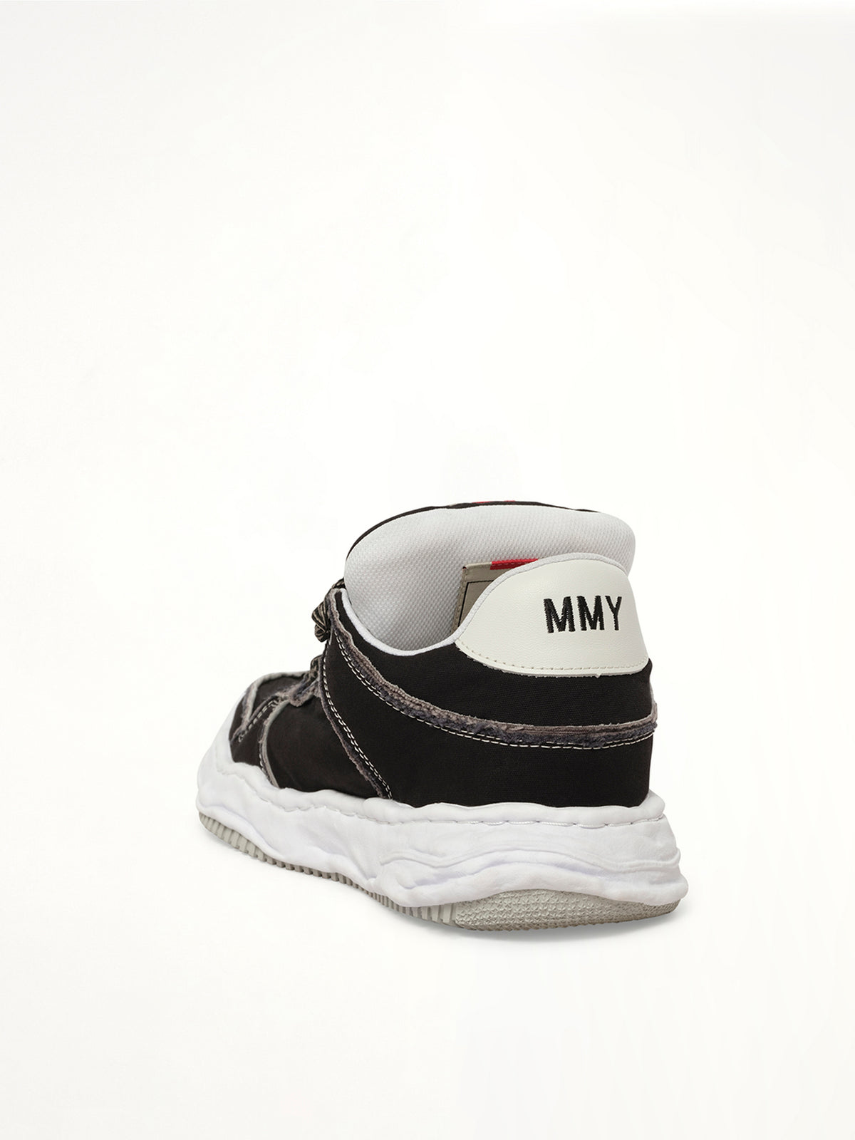 Wayne Puffer Patterned Lace Low Top Sneakers in Black