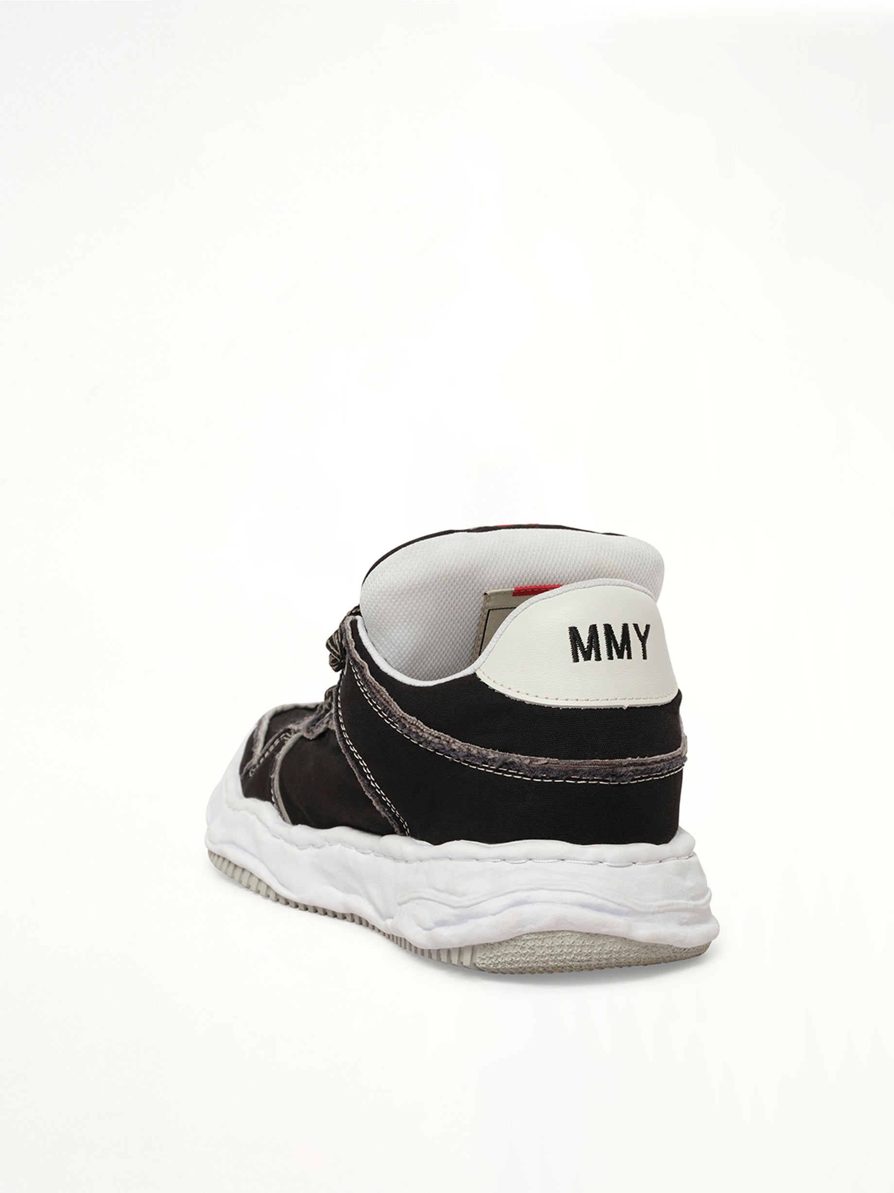 Wayne Puffer Patterned Lace Low Top Sneakers in Black