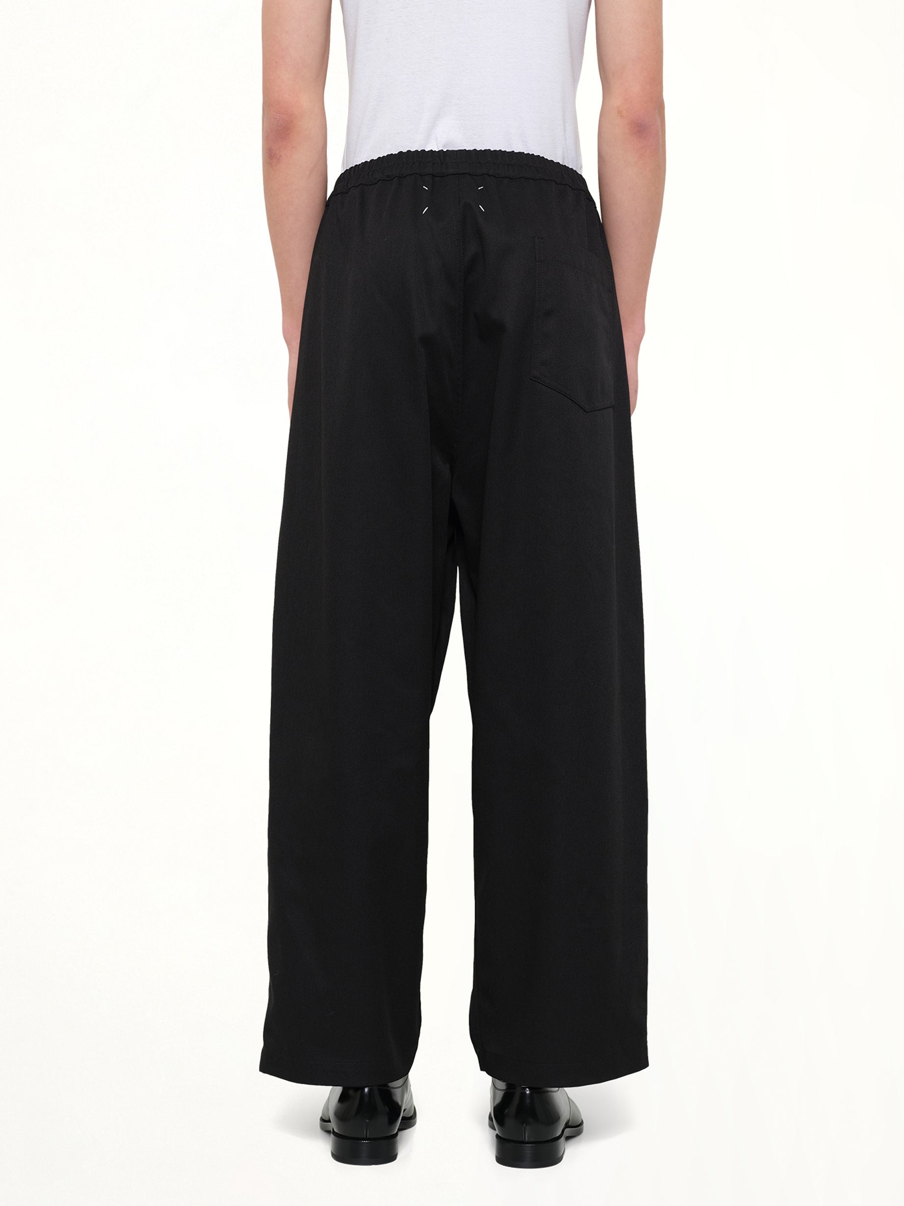 MAISON MARGIELA , Cropped Chino Pants in Black Back View from MARAIS