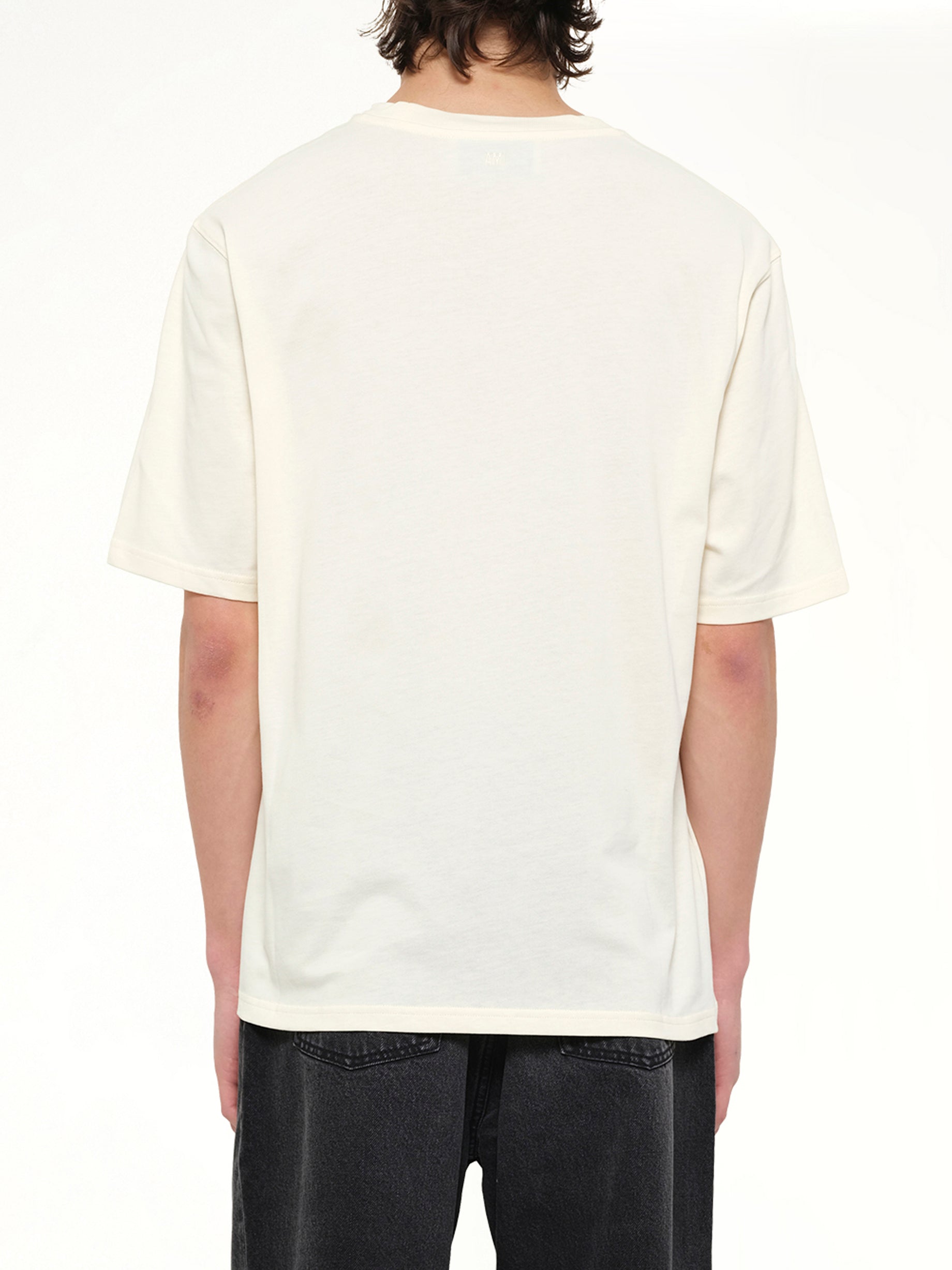 AMI PARIS Small Embossed ADC T-Shirt in Cream Back View from MARAIS