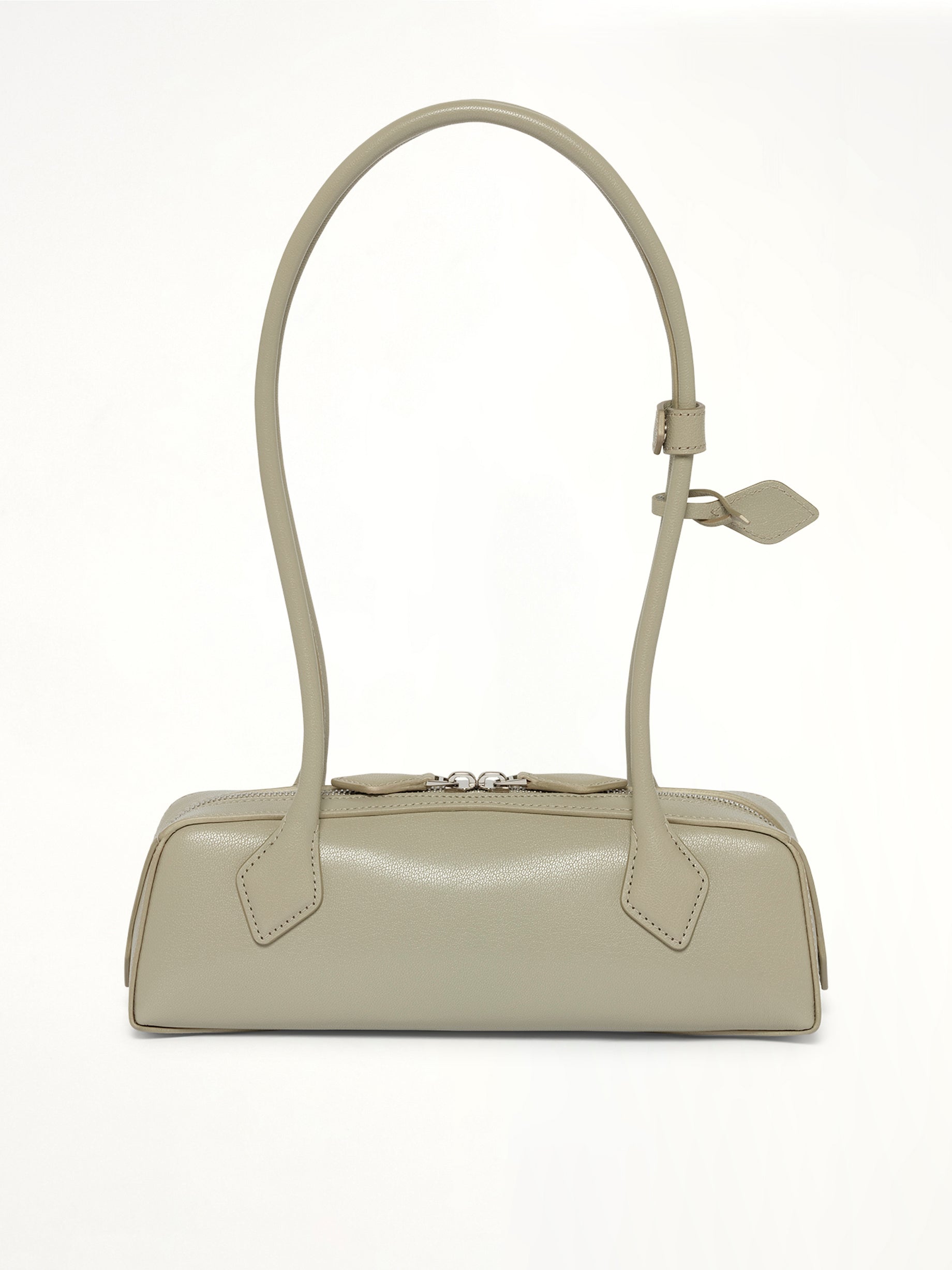 ALAIA Le Teckel Small Bag in Beige Side View from MARAIS