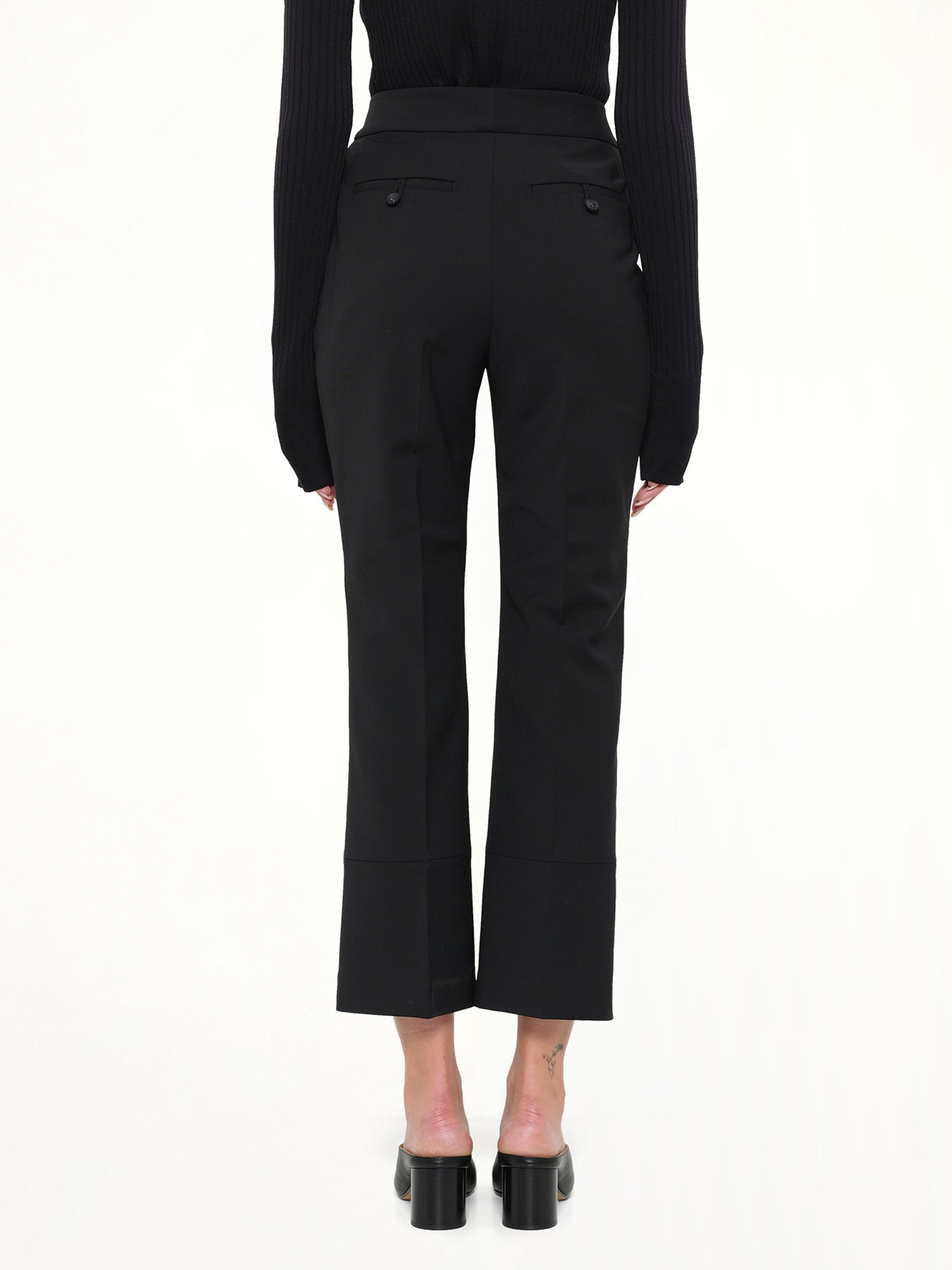 ENTIRE STUDIOS Step Hem Pants in Black Wool Back View from MARAIS