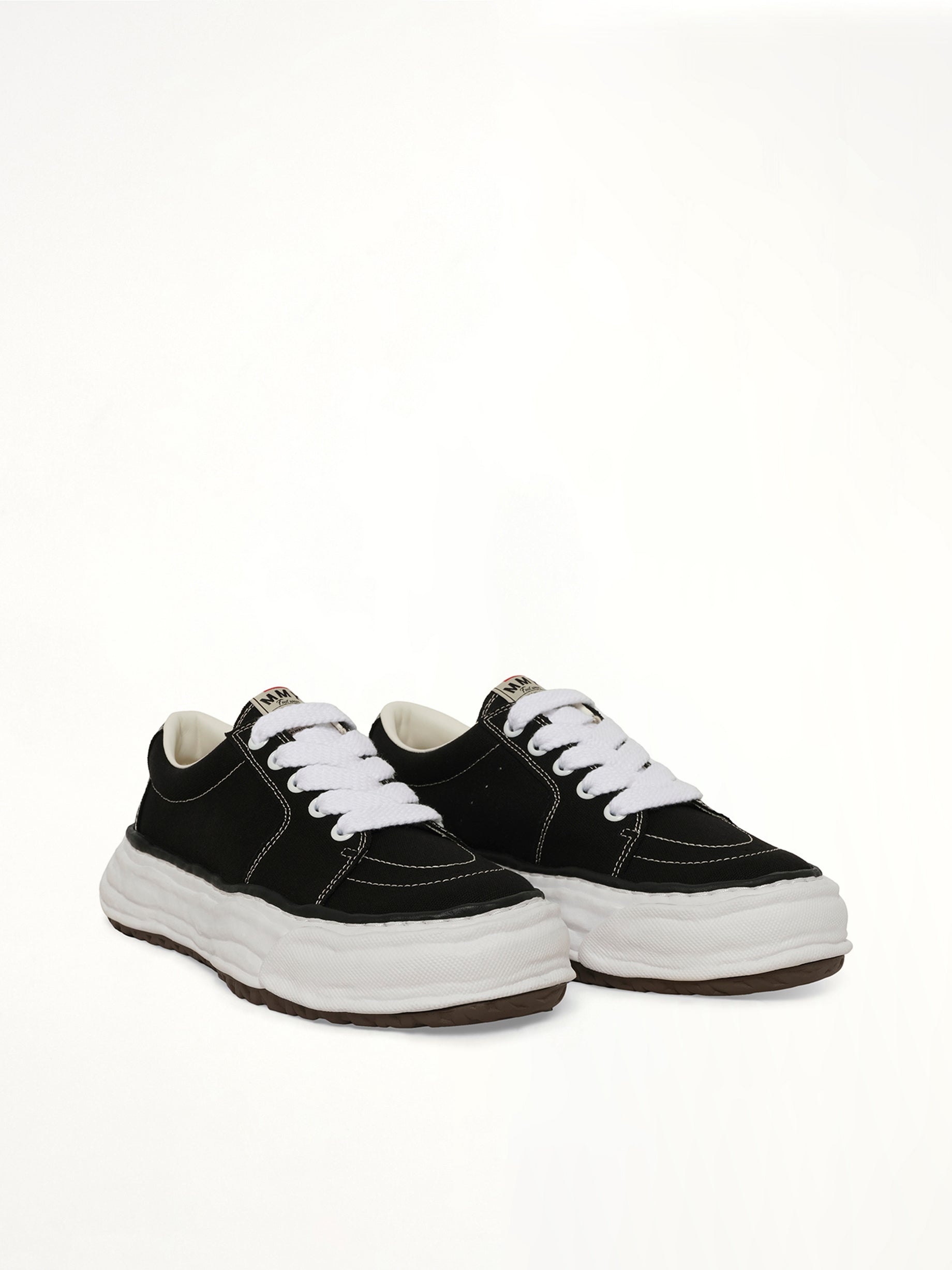 MAISON MIHARA YASUHIRO Eric OG Sneaker in Black/White Front View from MARAIS