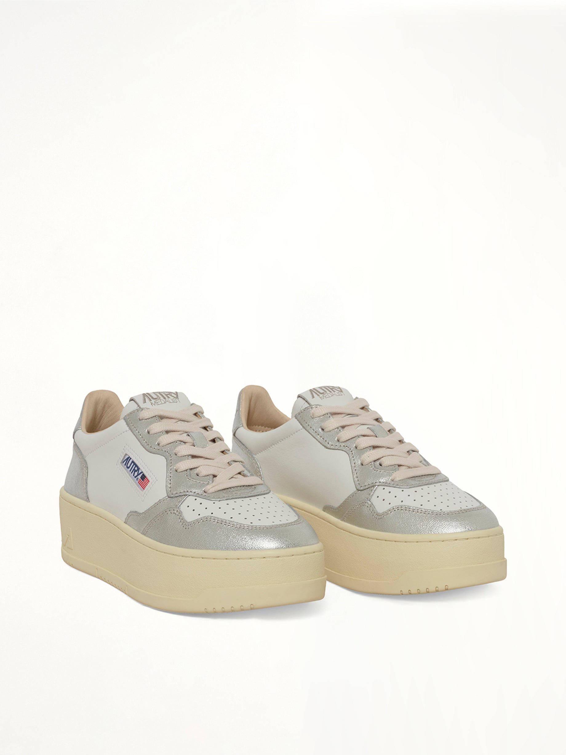 AUTRY Platform Low Sneaker in White/Silver Front View from MARAIS