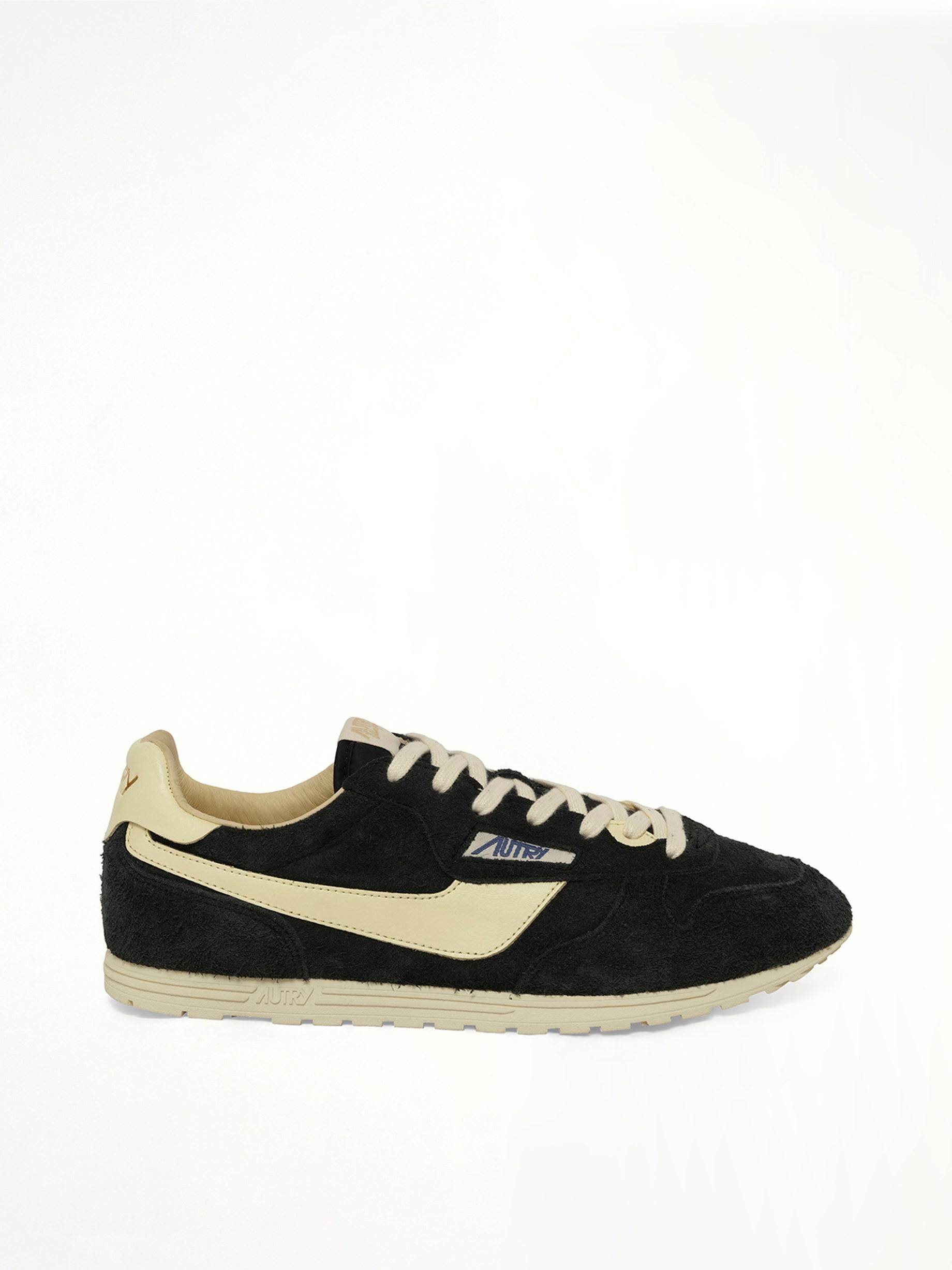 AUTRY Windspin Low Sneaker in Black/Rutabaga Side View from MARAIS