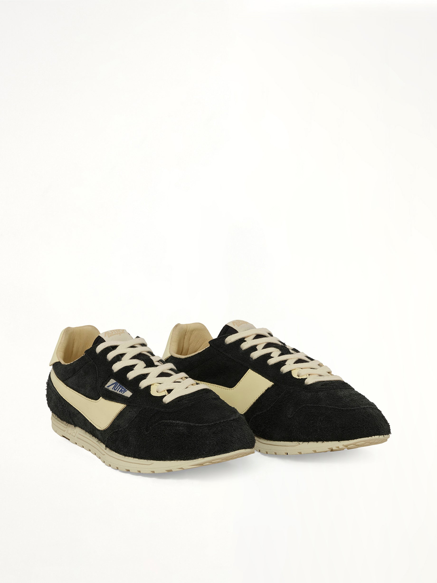 AUTRY Windspin Low Sneaker in Black/Rutabaga Front View from MARAIS