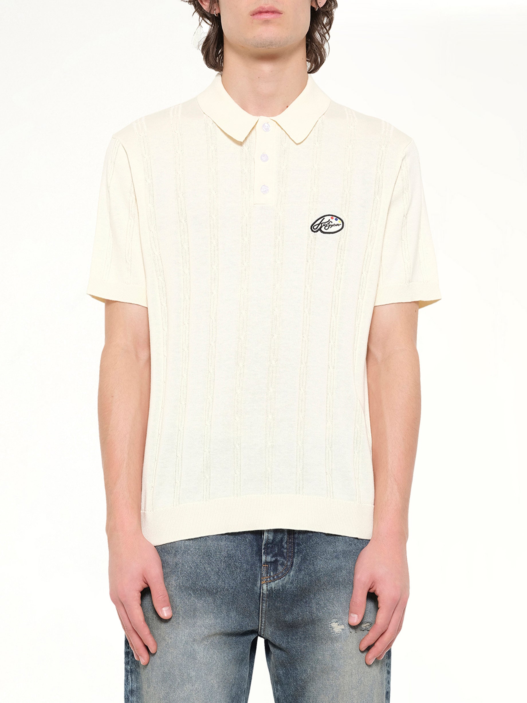 KIDSUPER Painters Logo Knit Polo in Cream Front View from MARAIS