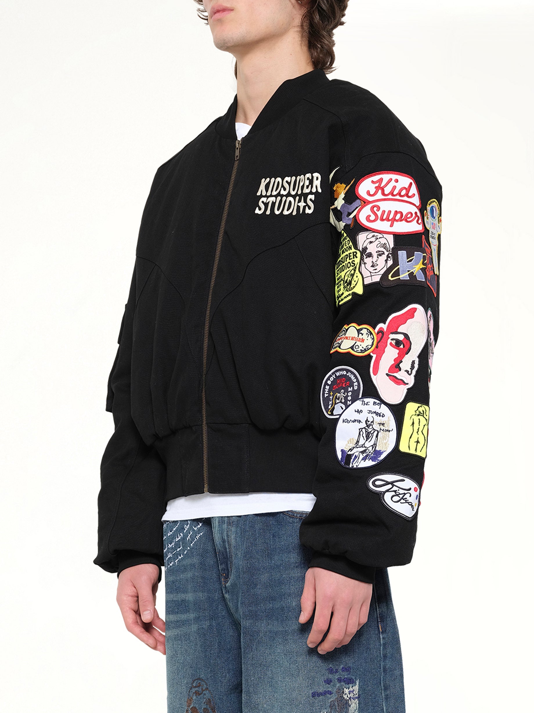 KIDSUPER Patches Bomber Jacket in Black Side View from MARAIS