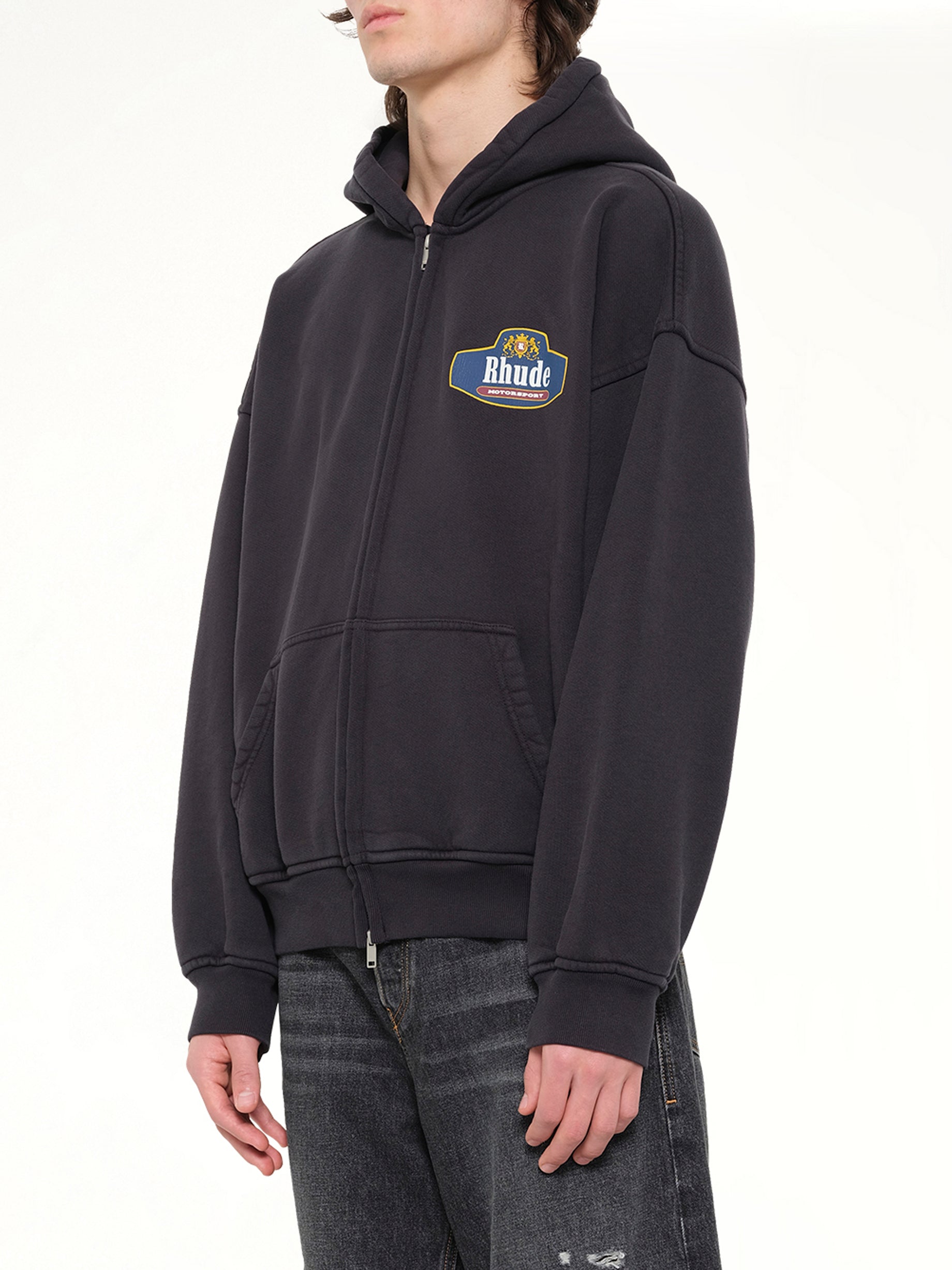 RHUDE Racing Crest Zip-Up Hoodie in Vintage Black Side View from MARAIS