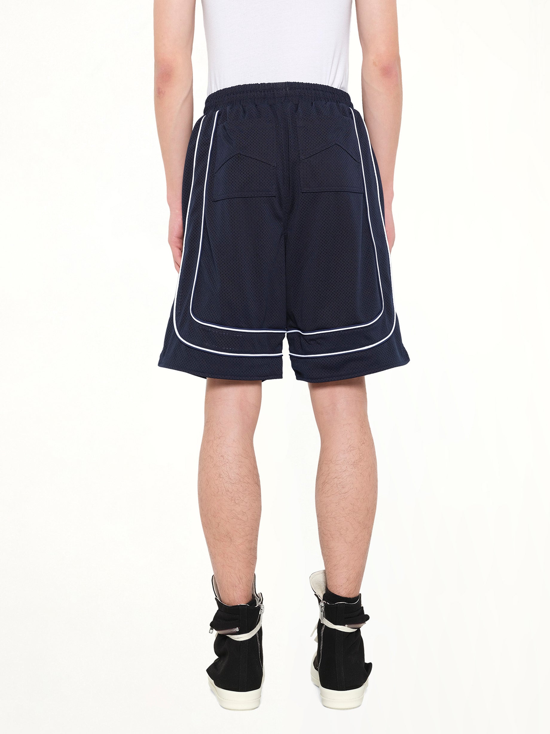 RHUDE Rhude Mesh Piping Baggy Track Short in Navy/White Back View from MARAIS