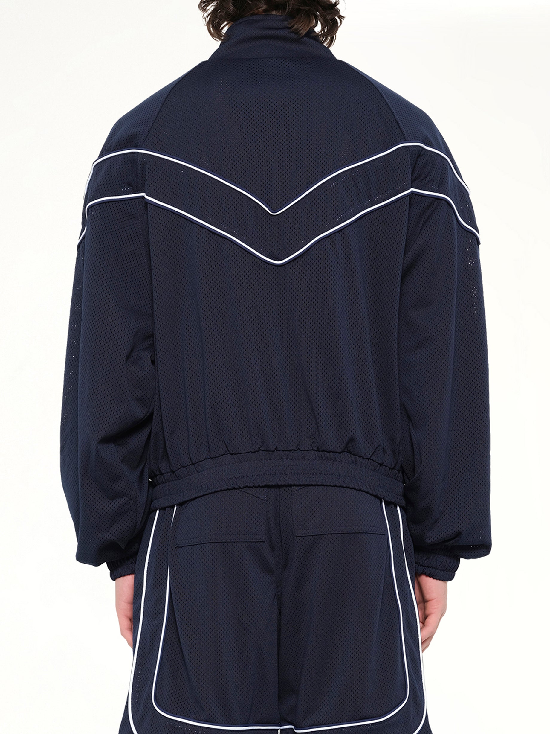 RHUDE , Rhude Mesh Piping Raglan Track Jacket in Navy/White Back View from MARAIS