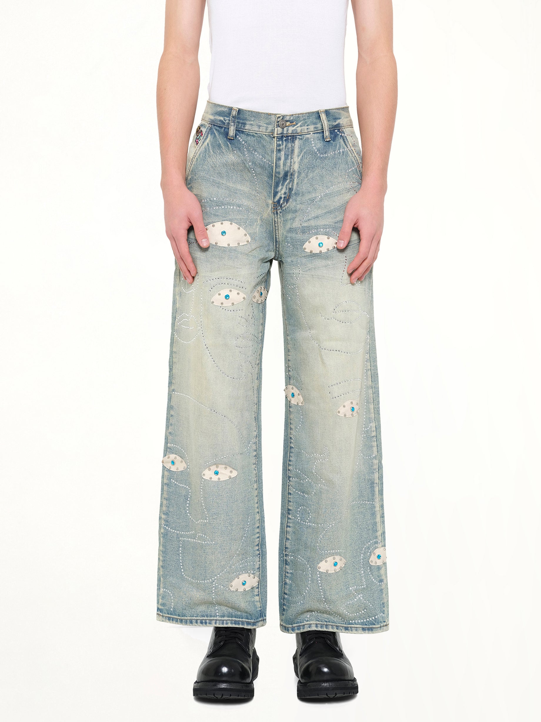 KIDSUPER Studded Face Jeans in Blue Front View from MARAIS