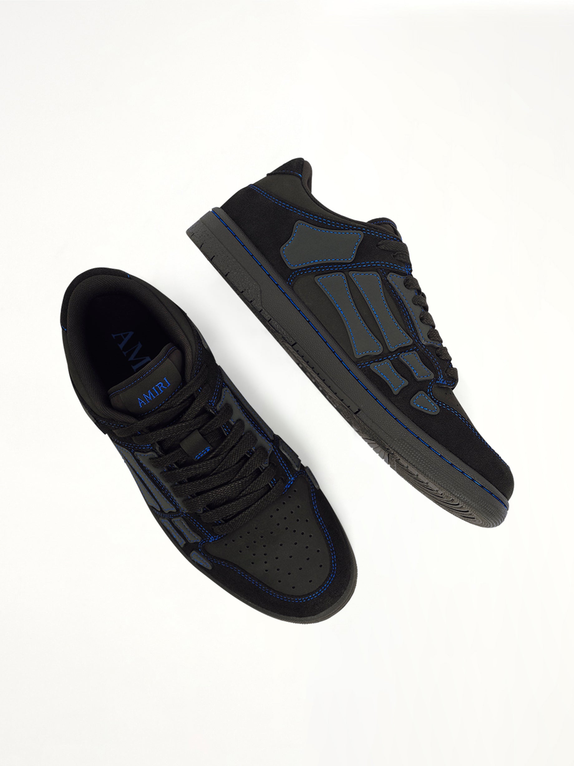 Skel Top Contrast Low Sneaker in Black/Blue