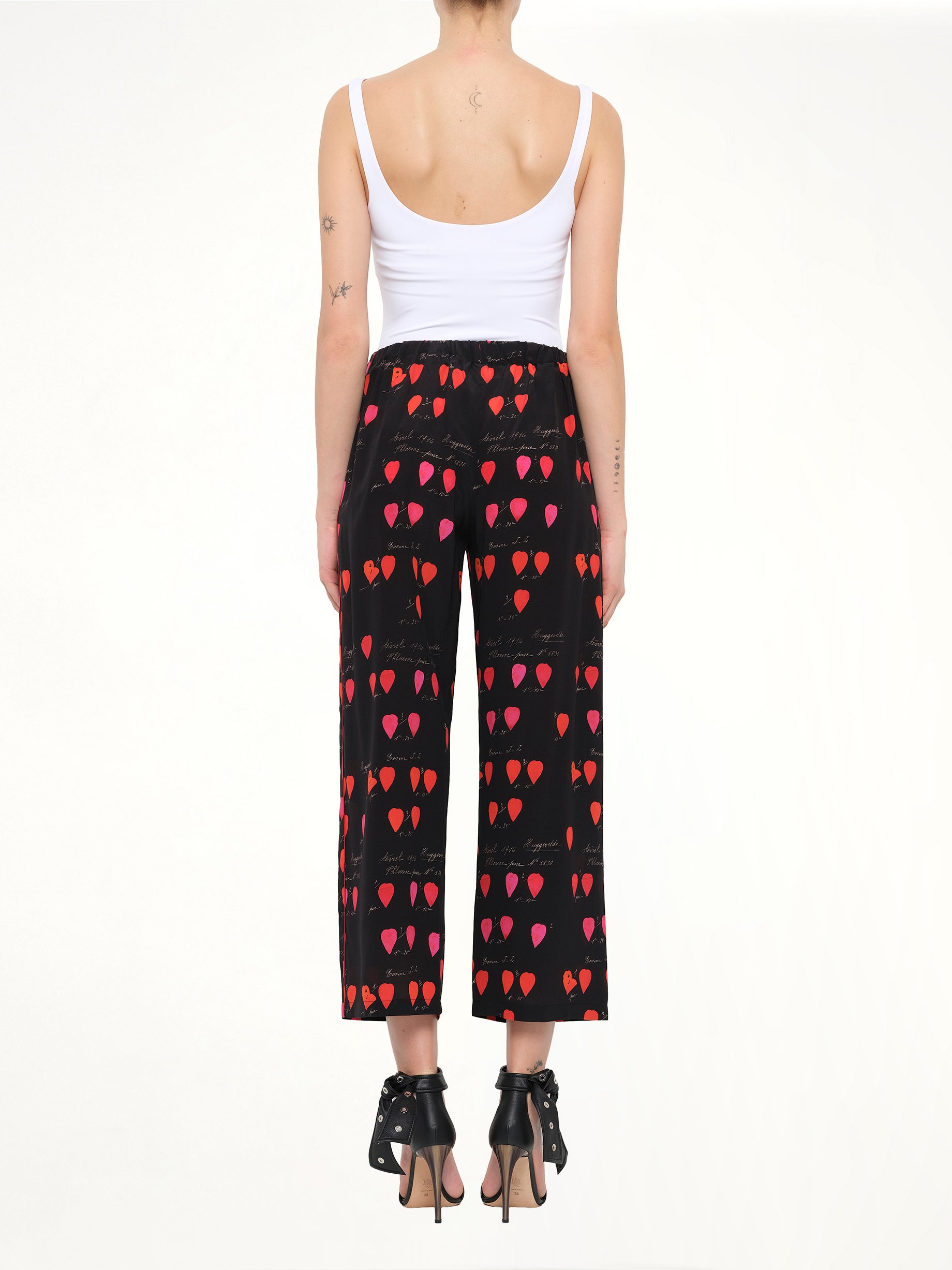 Alexander McQueen Petal Print Pants in Black/Red
