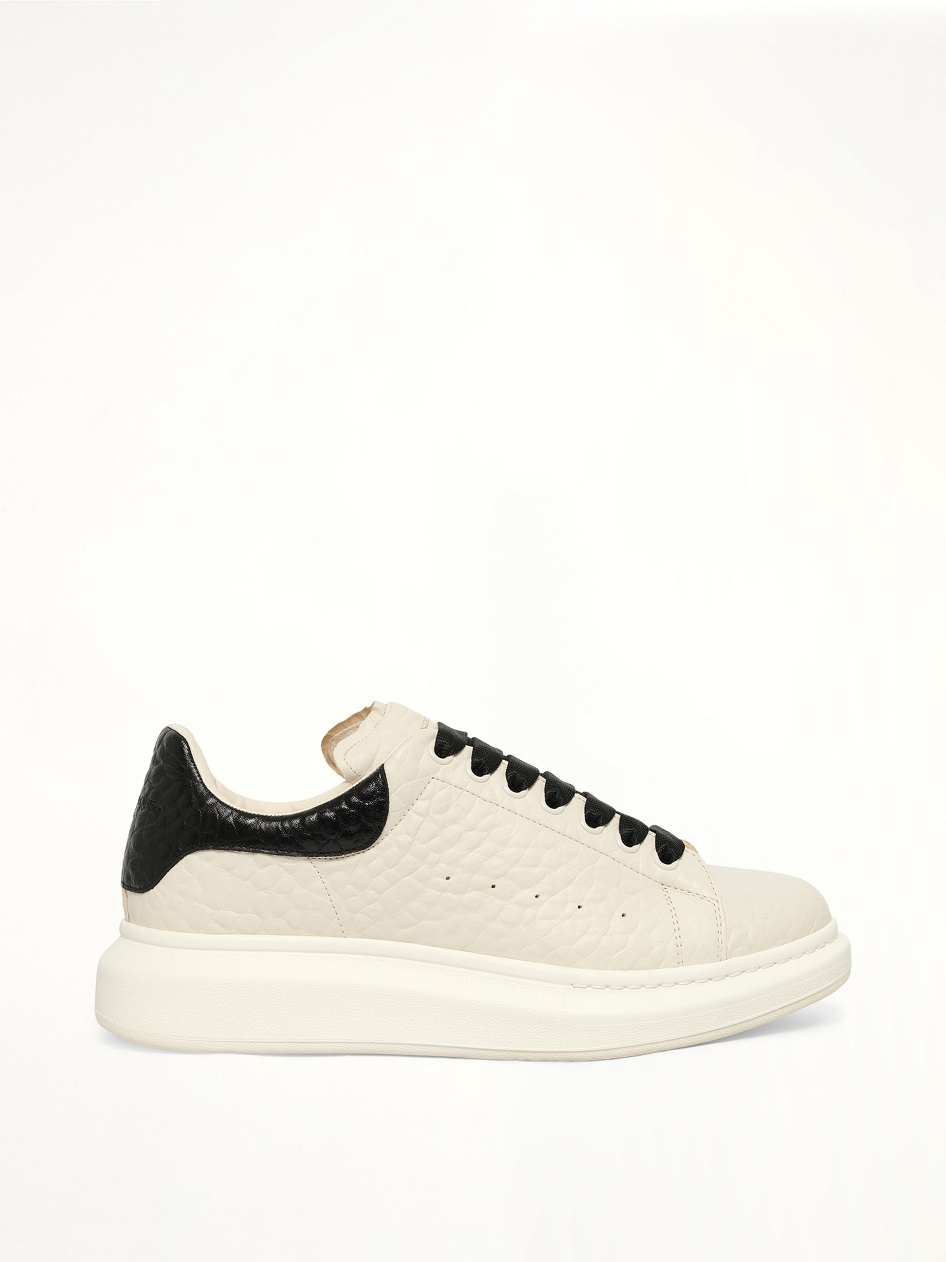 Larry Grained Leather Sneaker in Off White/Black