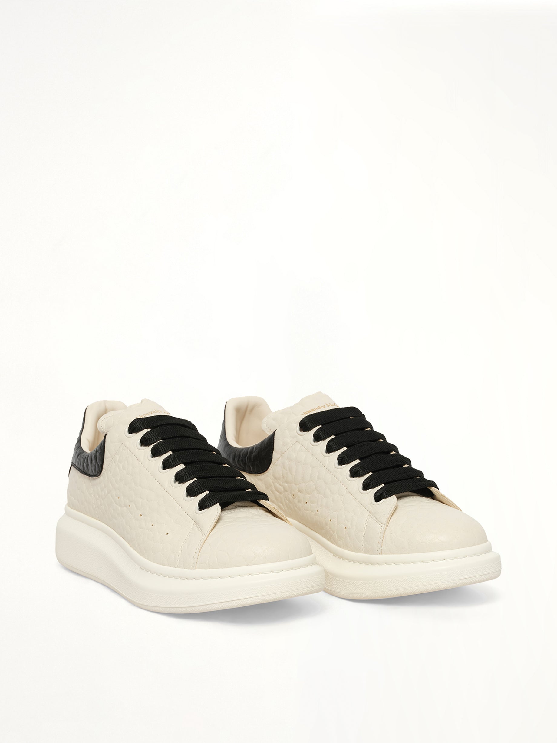 Larry Grained Leather Sneaker in Off White/Black