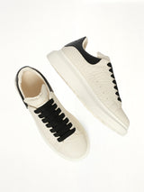 Larry Grained Leather Sneaker in Off White/Black
