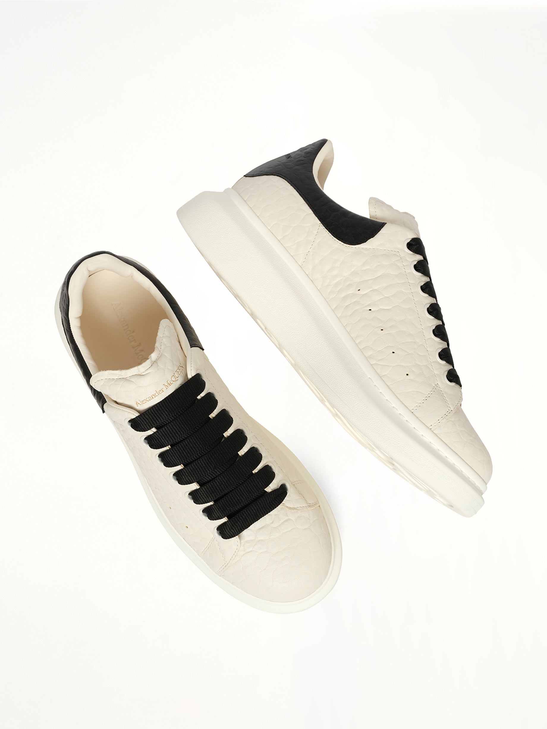 Larry Grained Leather Sneaker in Off White/Black