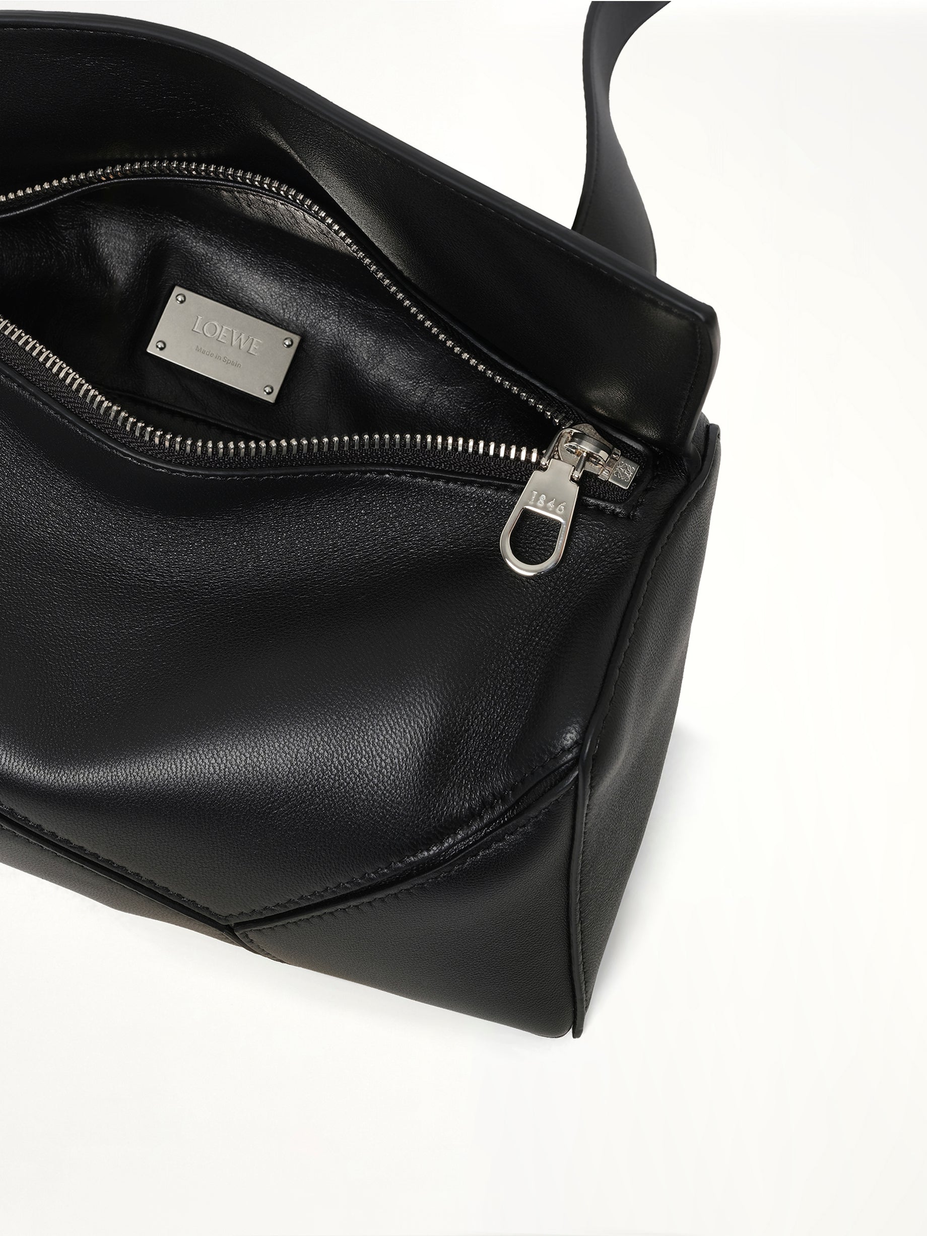 Puzzle Featherlight Sling Bag in Black