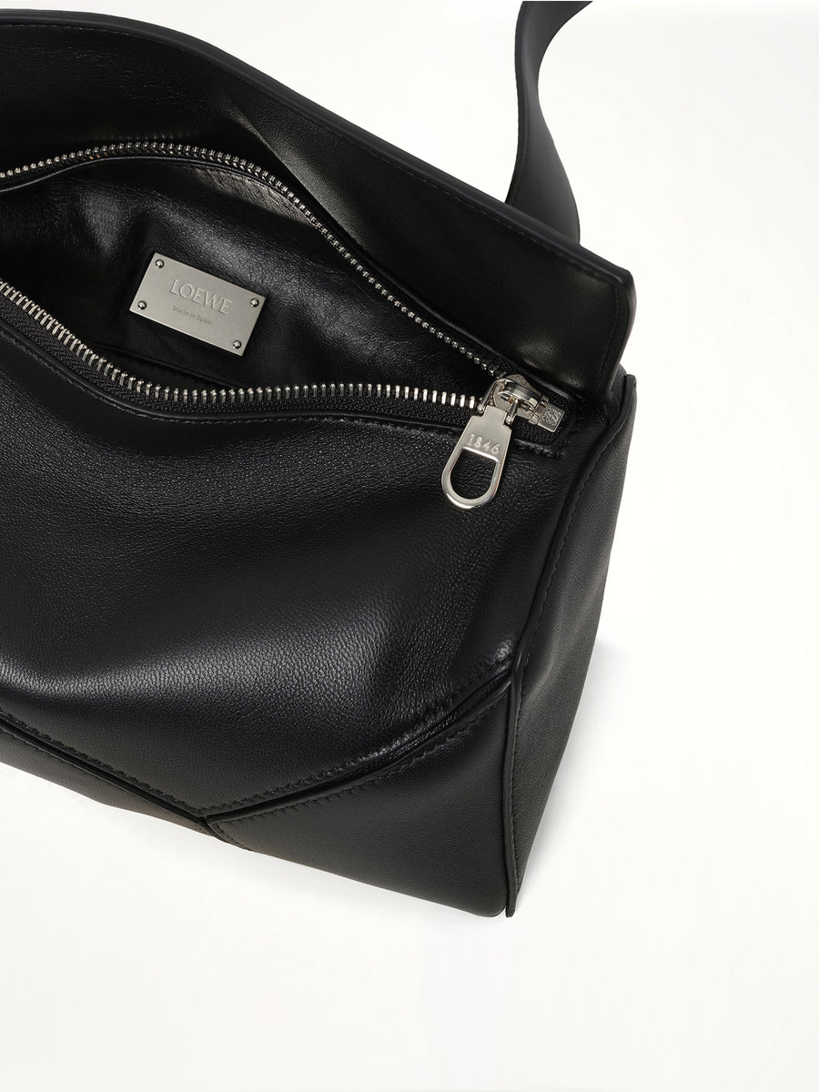 Puzzle Featherlight Sling Bag in Black