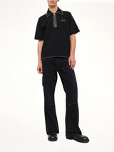 Leather Trim Knit Zipped Polo in Black