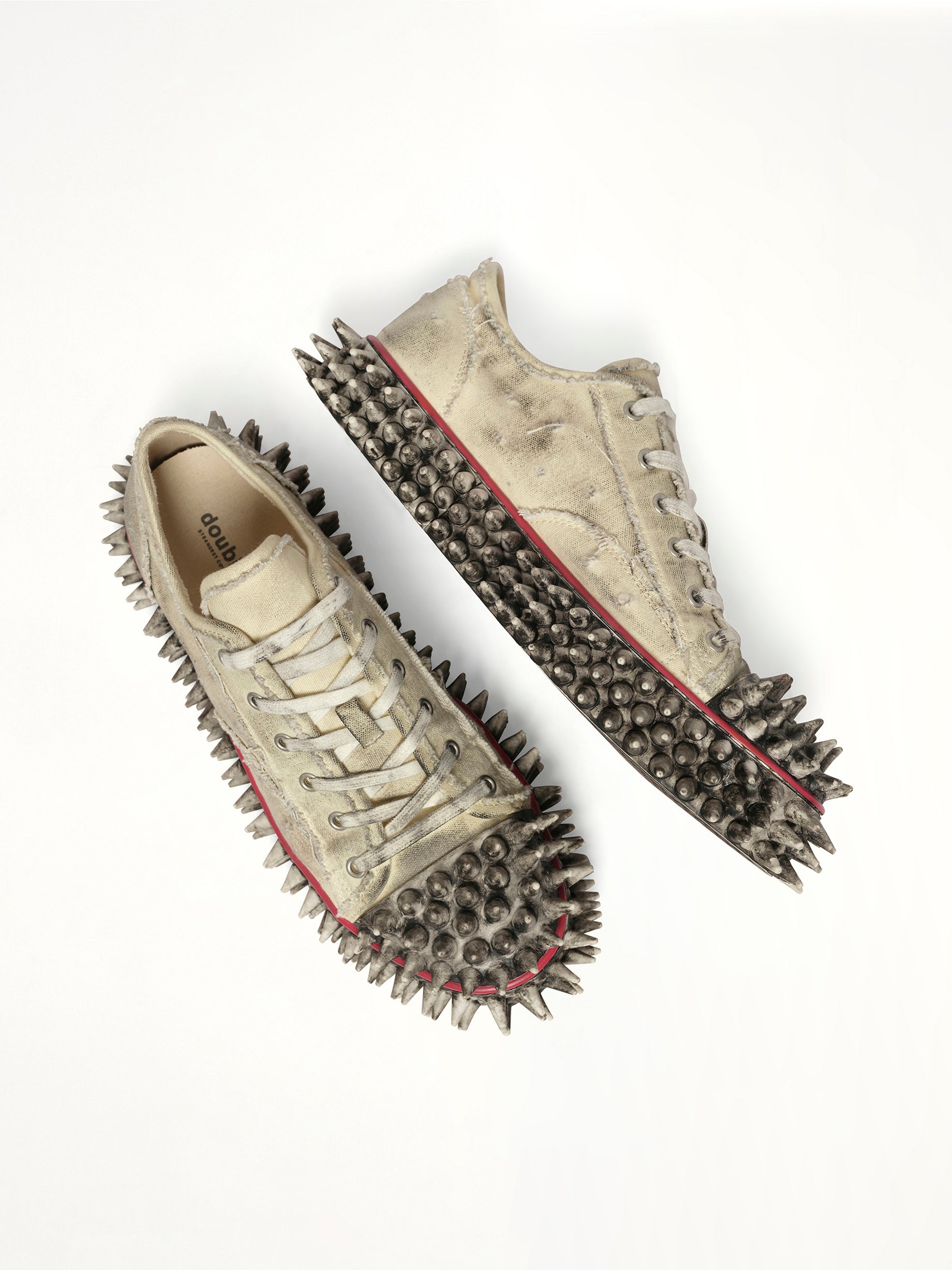 Dirty Spike Toe Cap Canvas Sneaker in White Top View | DOUBLET