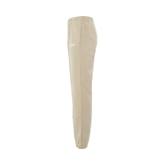 Logo Printed Track Pants in Light Beige