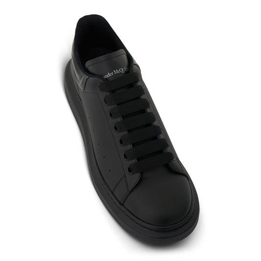 Larry Oversized Heel Sneaker in Black/Black