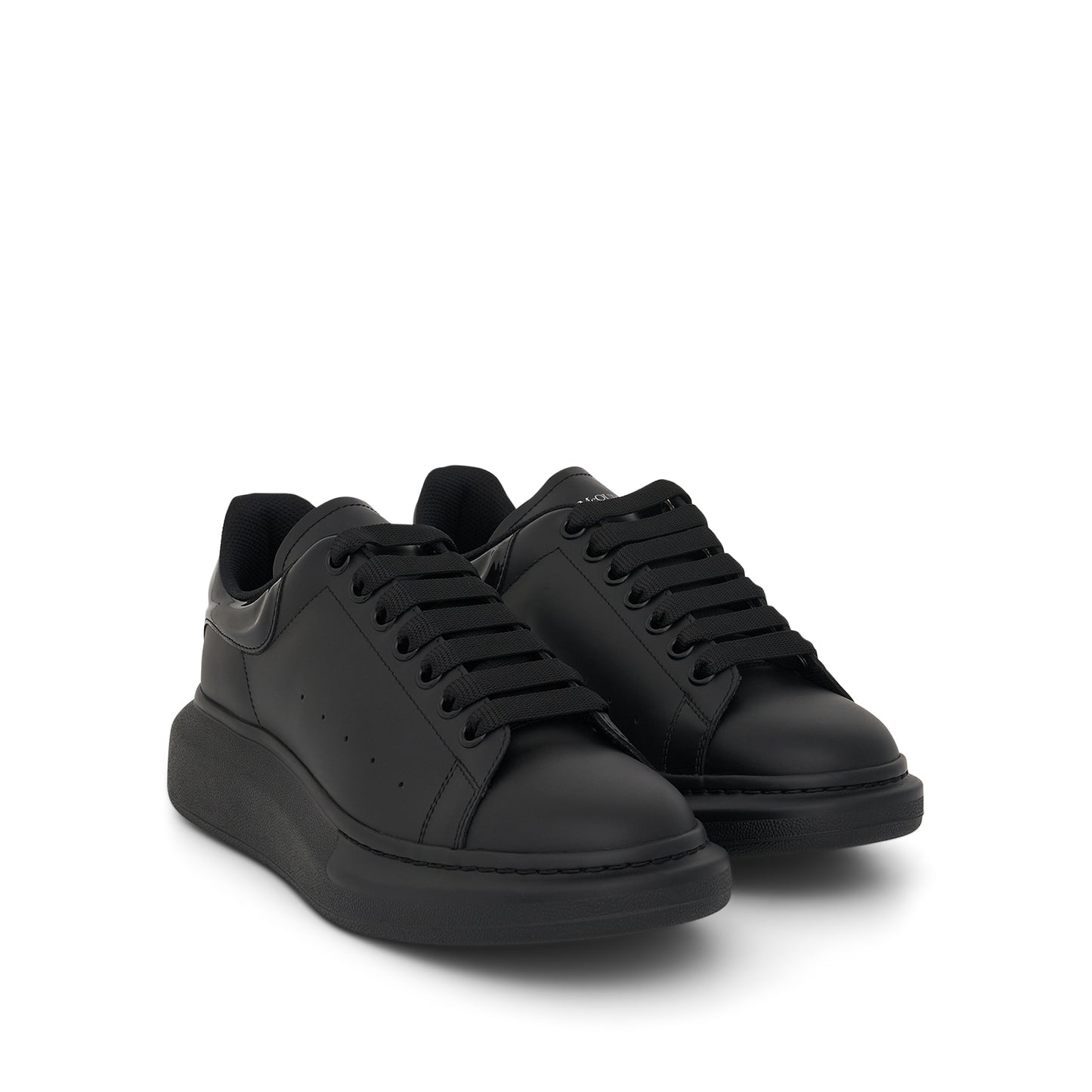Larry Oversized Heel Sneaker in Black/Black
