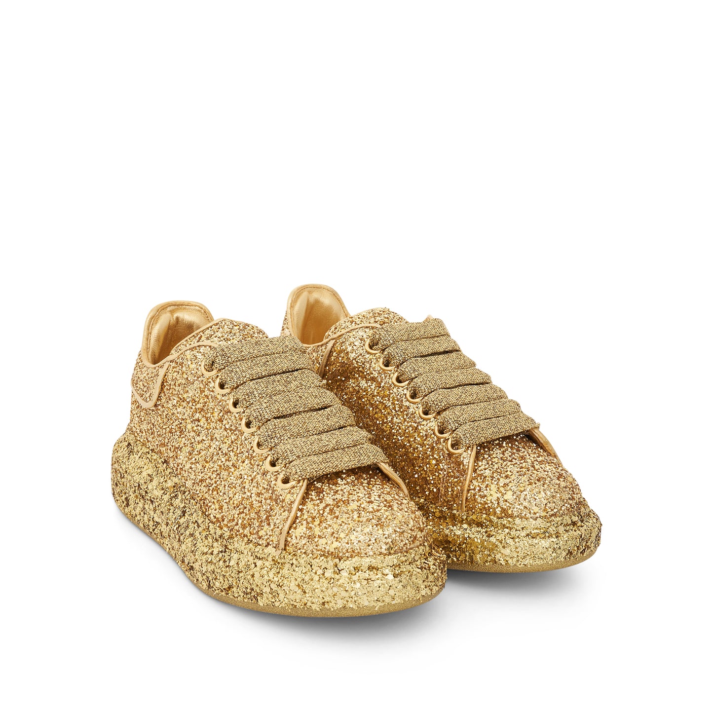 Larry Oversized Heel Glitter Sneaker in Gold