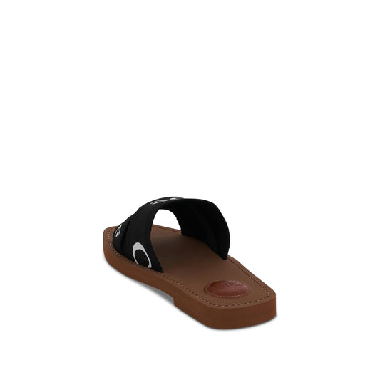 Woody Flat Mule in Black Canvas