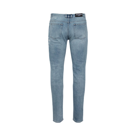 Monogram Destroy Tapered Jeans in Blue